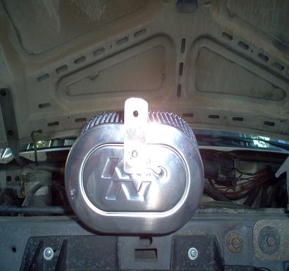 1988 Ford Bronco - Aftermarket K&N air filter assembly mounted in the engine bay.