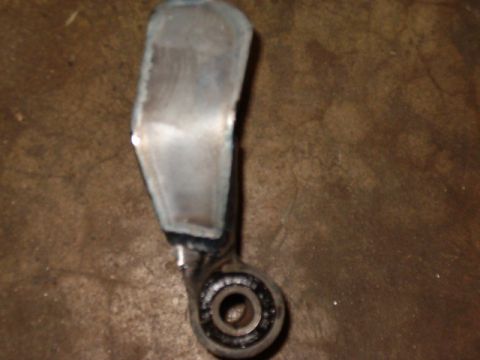 1988 Ford Bronco - This image shows a close-up of a modified metal component with a bearing, likely a vehicle part.