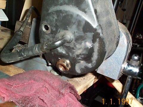 1992 Ford Bronco - Top bolt removed.