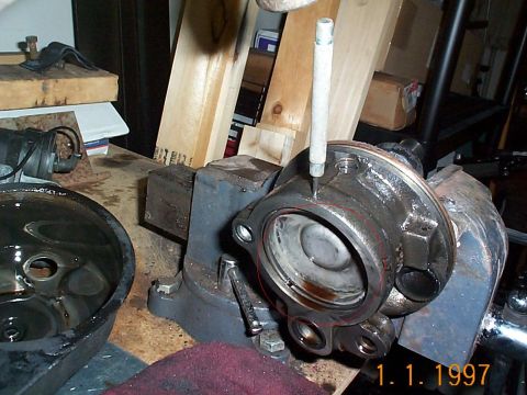 1992 Ford Bronco - In this pic you can see the retaining ring for the pump plate. This has to be removed. The is a small hole on the outside of the pump big e…