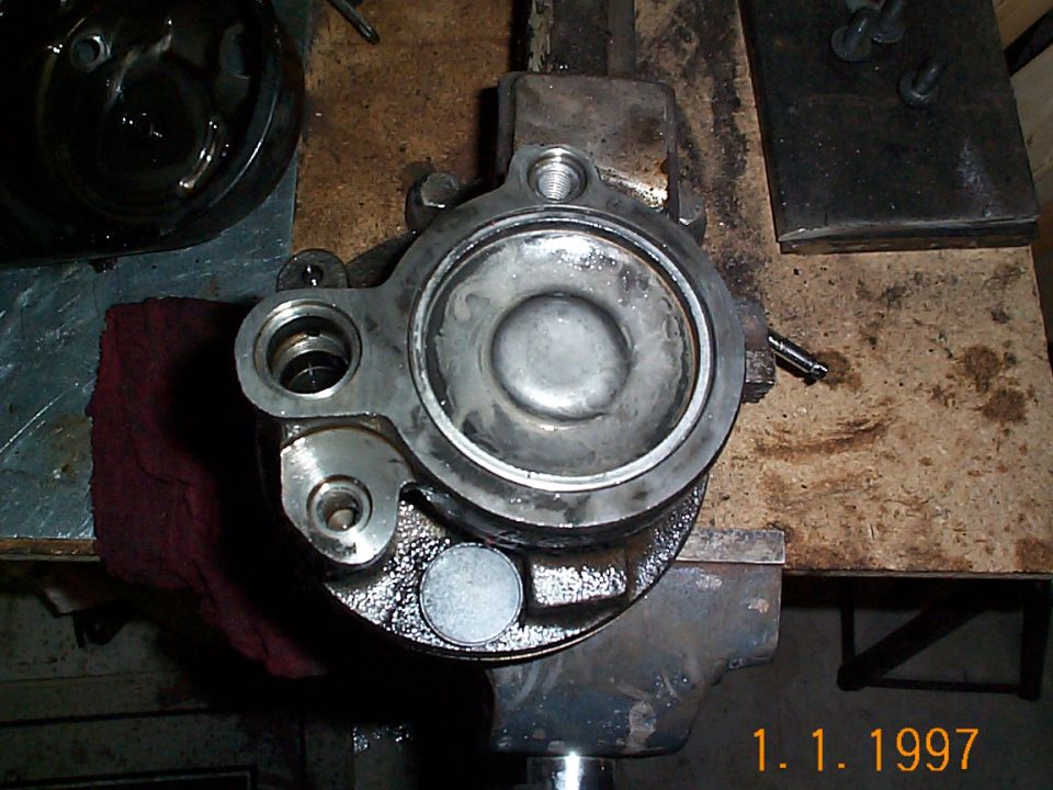 With the retaining clip off the plate will not come out.
