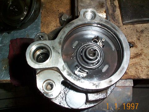 1992 Ford Bronco - This is the spring behind the retaining plate.