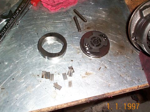 1992 Ford Bronco - These parts will all come out before you complete remove the shaft from the pump. Make sure you don't lose any of the small flat pieces, th…