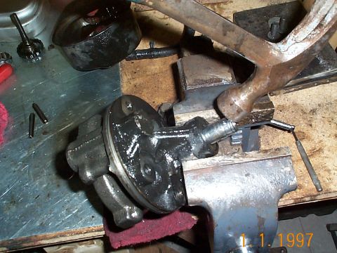 1992 Ford Bronco - I wound up putting it back in the vise and using a small socket to get the shaft the rest of the way out.