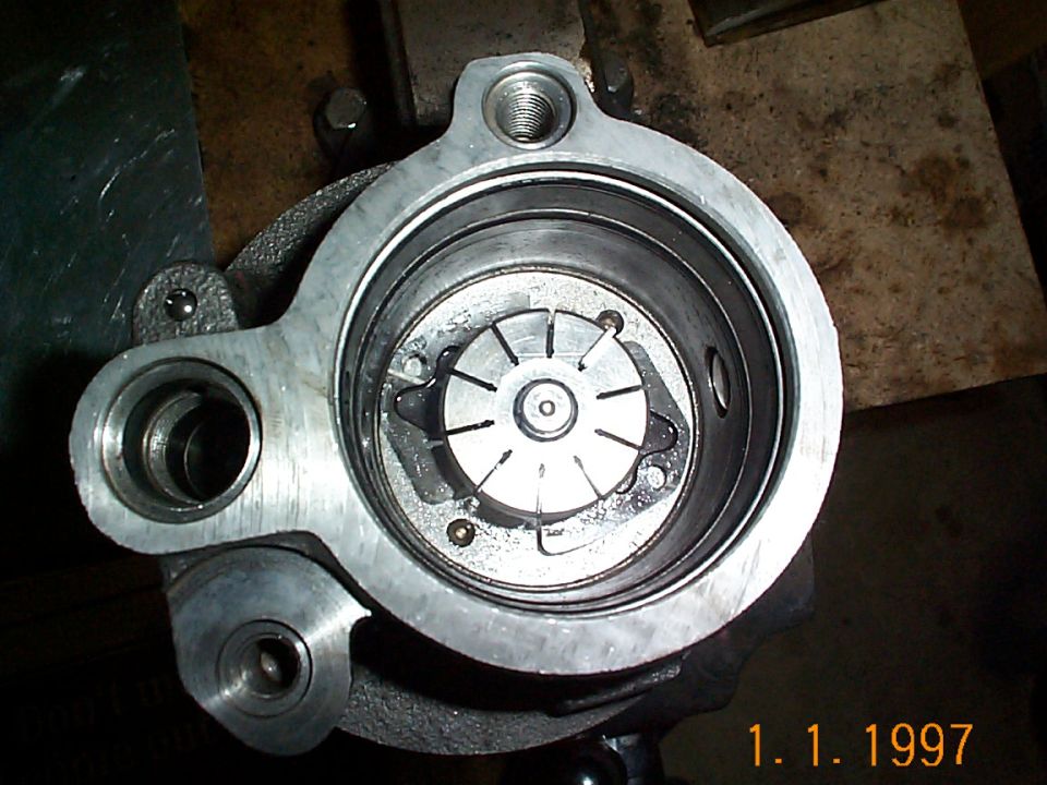 Reinstalling the shaft. I used a rubber mallet to tap it down, it went in pretty easily. It was at this point, I realized I had forgotten to replace the bushing the shaft goes through. If the bushing is in good condition you don't have to replace in..