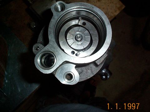 1992 Ford Bronco - Put all of the vanes back in their respective slots and put the inner part of the pump back over it. There were two metal rods that came ou…