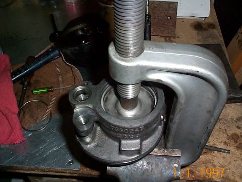 1992 Ford Bronco - I used my u-joint press to push the plate down so I could get the retaining ring on, the pressure from the spring behind it makes it imposs…