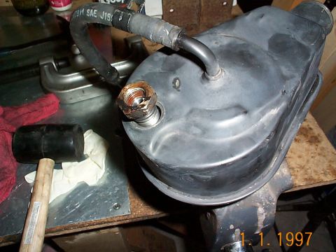 1992 Ford Bronco - Put the high pressure fitting bolt in. Again this uses a 1 inch wrench.