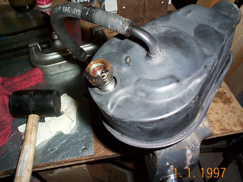 Put the high pressure fitting bolt in. Again this uses a 1 inch wrench.