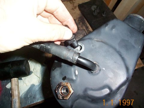 1992 Ford Bronco - Put the top retaining bolt in and tighten it down this bolt is very short so be careful when tightening. I used an 18 mm closed end wrench…