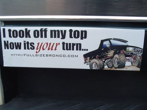 1993 Ford Bronco - A sticker on a vehicle reads 'I took off my top Now its your turn...' with a graphic of a lifted Bronco.