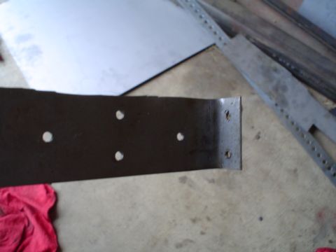 1981 Ford Bronco - holes drilled in bracket to rivet to ammo can