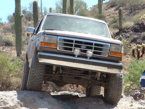 1990 Ford Bronco - This Ford Bronco navigates rocky terrain, its 1992 body style.