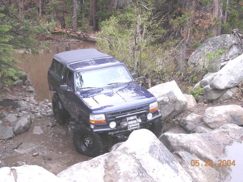 1994 Ford Bronco - me starting to climb soup bowl, note the water behind. there was LOTS of standing water all over the trail. the pouring rain the night befo…