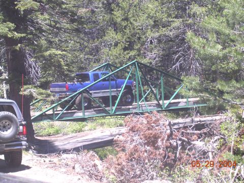 1994 Ford Bronco - Bill crossing the bridge into the Springs area. We all made it down the big sluice, and only Dan ran into a small problem.