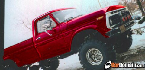 1990 Ford Bronco - This lifted pickup truck features a custom grille guard and aggressive off-road tires.
