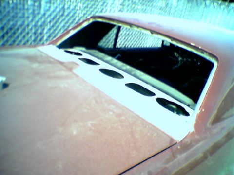 1967 Ford Mustang - all glass removed and rust cut out on the trunk deck and repair all around windows..