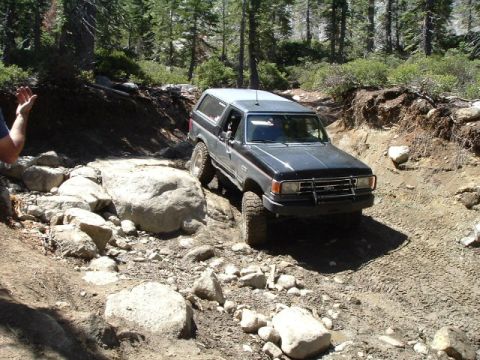 1989 Ford Bronco - This 1989 Ford Bronco tackles a challenging rocky path on an off-road adventure.