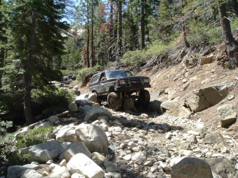 1989 Ford Bronco - dan high centered in front, when he got off that rock he came down hard on his tranny pan which bent up into the linkage inside his tranny…