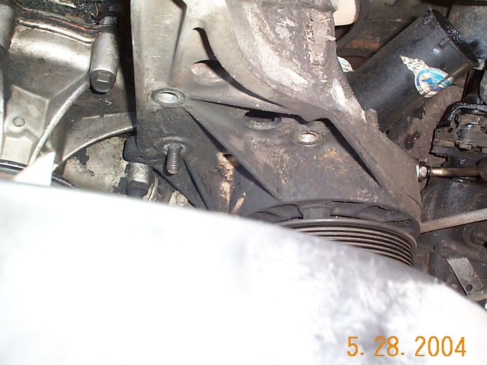 Now you can remove the bolts from the pump bracket, there are 3 bolts and one nut.