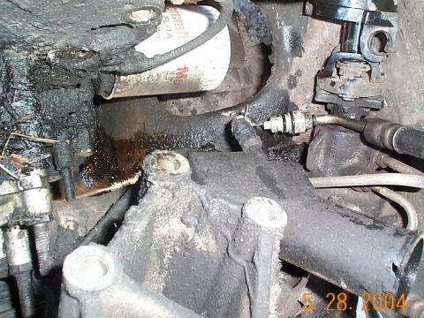 1992 Ford Bronco - The bracket w/pump will lift right out.