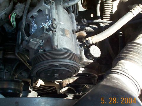 1992 Ford Bronco - Put the A/C compressor back on.