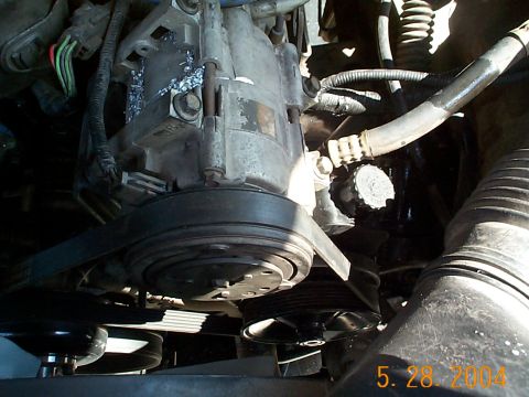 1992 Ford Bronco - Reinstall the serpentine belt. I put the stock one on but it felt to tight so I stepped up one size. Don't forget to add powersteering flui…