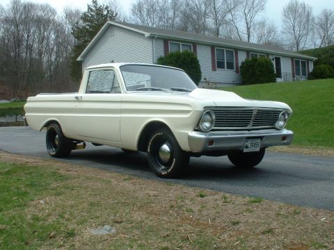 1965 Ford Ranchero - This pickup truck, likely a 1964 model, is viewed from the front three-quarter angle.