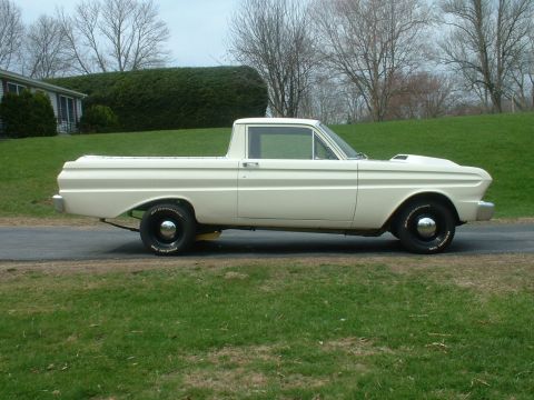 1965 Ford Ranchero - This 1965 Ford Ranchero features a distinctive hood scoop and custom wheels, presented in a side profile view.