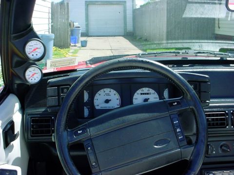 1973 Ford Ranchero - Interior view of a car's dashboard, showing the steering wheel and instrument cluster.