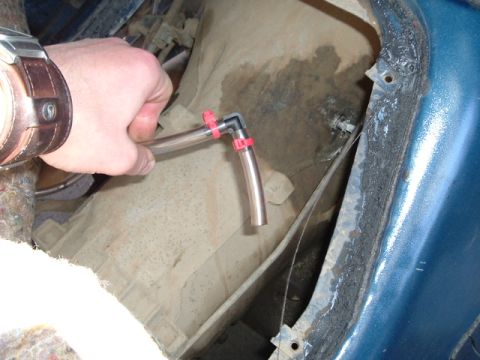 1989 Ford Bronco - the angle of the hose was not allowing it to hold in, so i used a 90* bend to get it right.