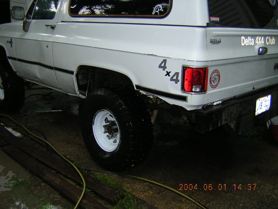 White Chevrolet K5 Blazer rear view with 4x4 decals and "Delta 4x4 Club" text