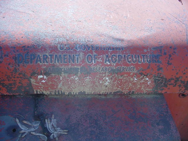 Label on red painted metal reads U.S. GOVERNMENT DEPARTMENT OF AGRICULTURE RESEARCH SERVICE