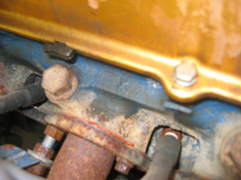 1978 Ford Bronco - Engine component detail with visible bolts and hoses, Supermotors.net watermark present.