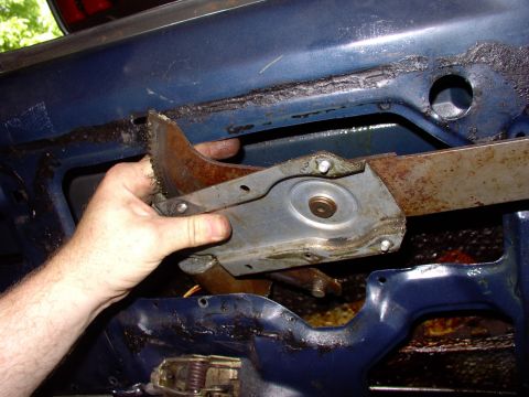 1986 Ford Bronco - Look how easy those bolts and nuts were to remove. Forget putting rivets back, this way you can remove the window mechanism (like we're doi…