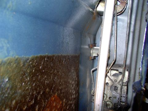 1986 Ford Bronco - The outer window seal track is in the way of getting at everything lock or handle related. One bolt removes it.