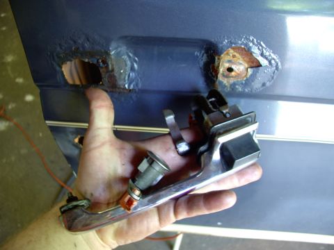 1986 Ford Bronco - Next out is the handle(save plastic gaskets) and lock cylinder with hold in clip. BTW my aftermarket door wouldn't accept the clip from out…