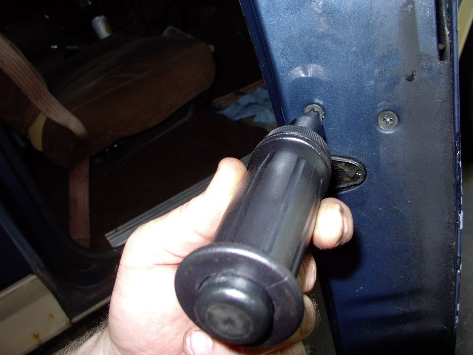 Next out is the latch mechanism. These screws are almost always seized, so.... impact driver to the rescue.  You can bet they went back in with anti-seize on their threads !