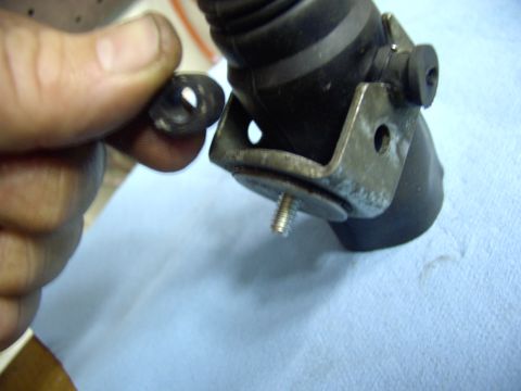 1986 Ford Bronco - An old Austin trick. Stuff a piece of fuel hose between the actuator housing and the bolt to hold it still while you install it. Leave it i…