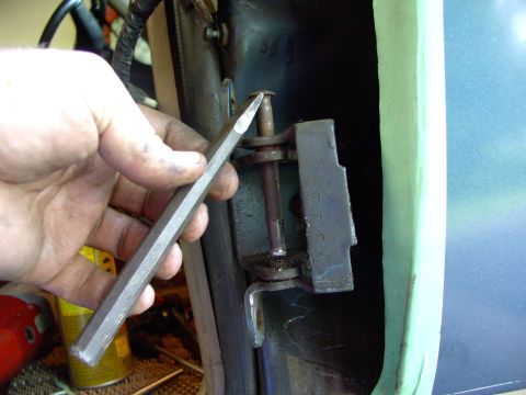1986 Ford Bronco - Nice shot of the punch. The truth is I clamped on the visegrips and beat them upwards with a ball peen hammer.