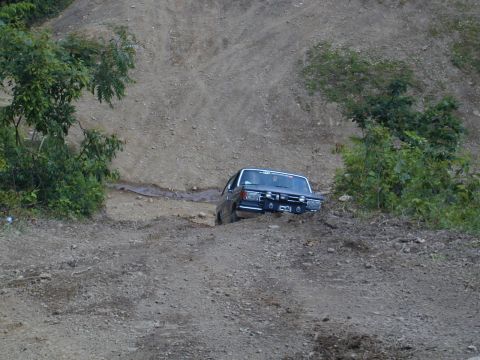 1988 Ford Bronco - This 1988 Ford Bronco navigates a challenging off-road terrain.