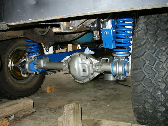 Rear axle and suspension with blue springs and silver components