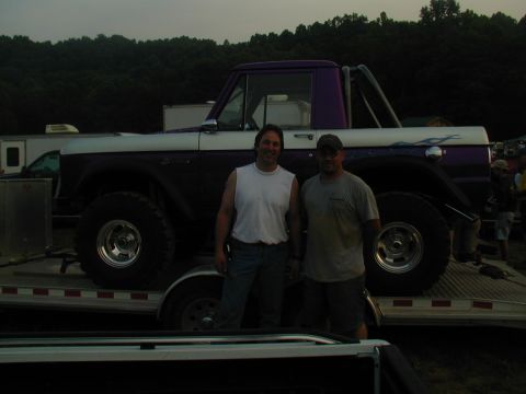 1988 Ford Bronco - This lifted Ford Bronco has a custom purple and white paint scheme with flame decals on the rear quarter panel.
