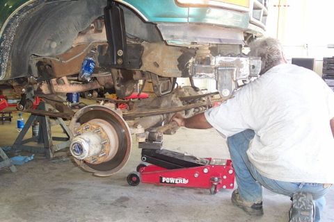 1990 Ford Bronco - Dave gets excited as the 60 is rolled into place