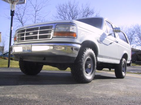 1993 Ford Bronco - This 1993 Ford Bronco is shown from the front quarter angle, its distinctive grille and front bumper.