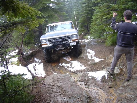 1991 Ford Bronco - Ford Bronco tackles a challenging off-road course in a wooded area during May 2004.