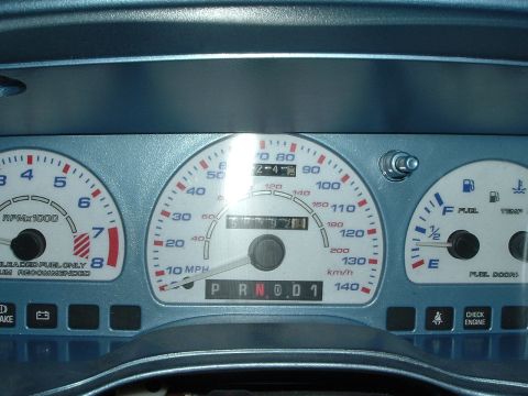 1993 Ford Taurus - Dashboard gauges showing speed, RPM, fuel level, and temperature.