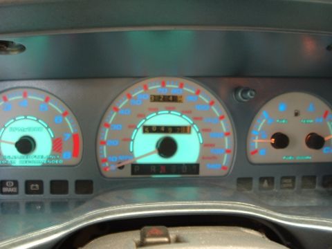 1993 Ford Taurus - The dashboard gauges of a 1993 Ford Taurus display the odometer reading of 50,497 miles.