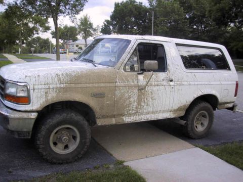 1993 Ford Bronco - This white Ford Bronco appears to be from the early to mid-1990s, not a 1993 model as claimed.