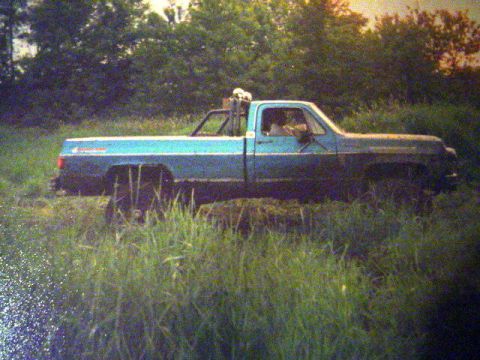 1993 Ford Bronco - This pickup truck appears to be from the mid-1970s, not a 1993 Ford Bronco.